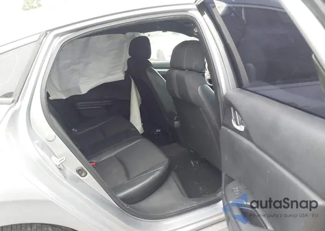 2019 Honda Civic Sport z USA, uszkodzony, nr VIN 19XFC2F86KE040457